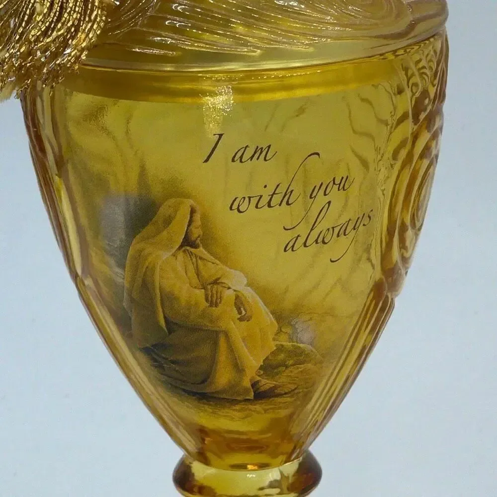Vintage Amber Glass Religious pedestal goblet with music box lid.